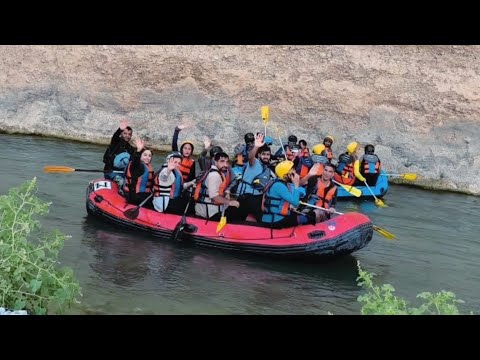 Fire tea on river rocks rafting and milking a goat