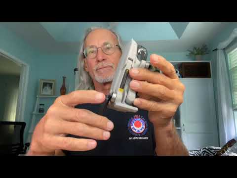 How to close the arms on dji mini Drone