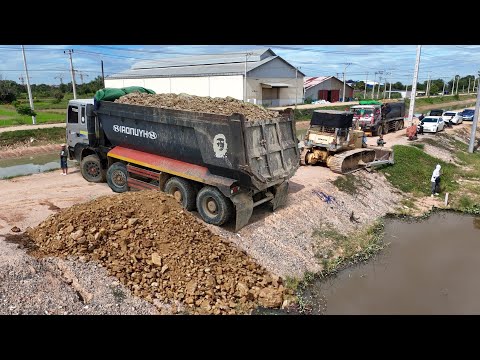 Process Nicely Project, 25.5ton Dump Truck dumping soil with BIG Dozer KomatSu Pushing