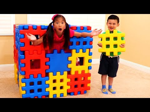 Wendy Pretend Playing with Colored Toy Blocks