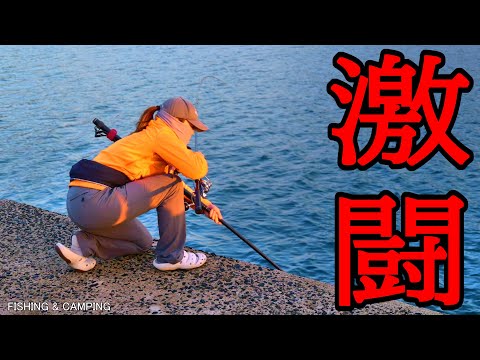 A woman went fishing and caught a big fish, which dragged her along the bank...