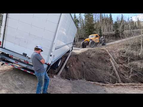 How Is This Not Tipping Over?! (Moving Truck Hangs Over The Edge)