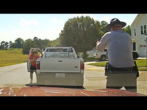Dashcam Shows Trooper Shooting a Man Who Came Out Of His Car With a Gun in His Hand