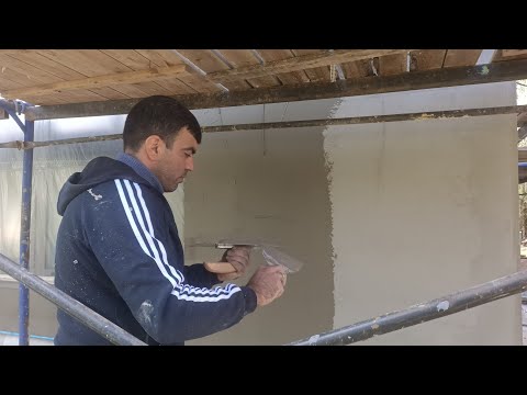 A base reinforcing layer of glue and Facade Glass Fabric Mesh, re-tightening the base with glue b...