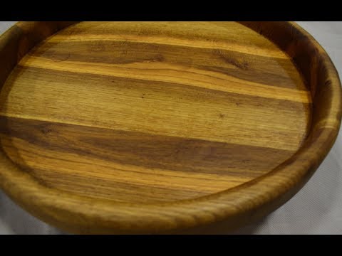 The dish is made of Oak, hand router.