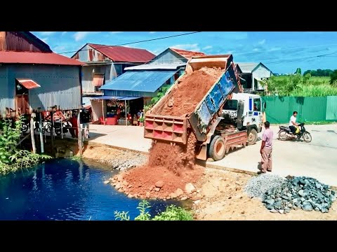 Start Opening New Project!! KOMAT'SU Bulldozer D20P pushing Soil into flooded​ Pond& 5Ton Trucks.