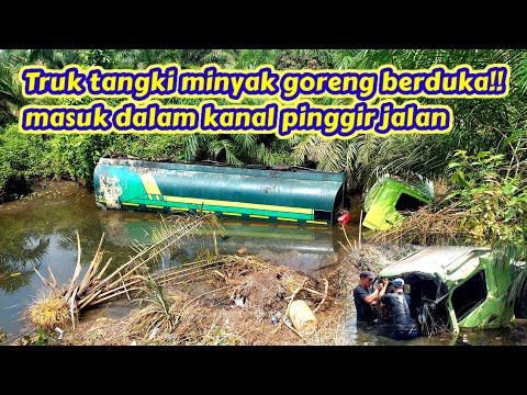 Truk tangki minyak goreng berduka !! masuk dalam kanal pinggir jalan