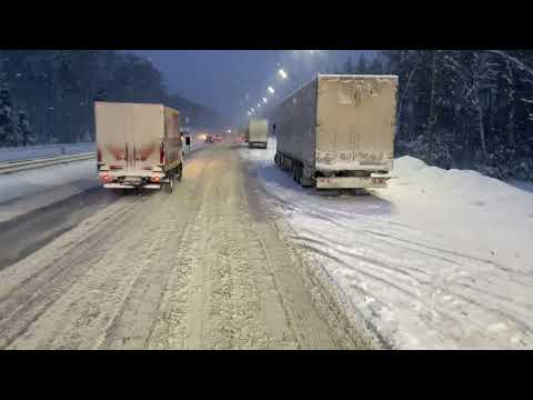 Trucks are stuck. No one can get out. Heavy snowfall on the M7 highway.