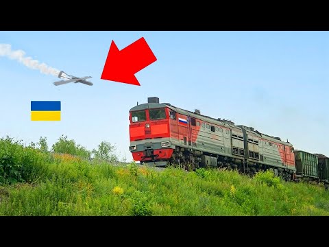 Watch Ukrainian Drones OBLITERATE a Russian Train