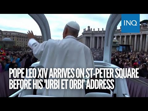 Pope Leo XIV arrives on St-Peter Square in the popemobile before his 'urbi et orbi’ address