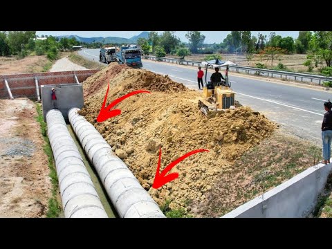 Buried the twin sewers system next to the highway. Drivers passing by must be very careful.