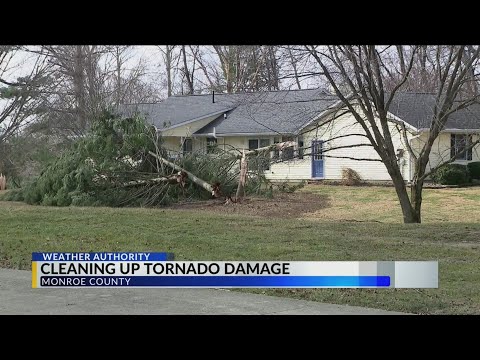 Cleaning up tornado damage throughout Monroe County