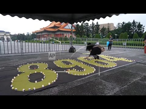 Taiwan residents hold candlelight vigil in memory of Tiananmen crackdown on pro-democracy protesters