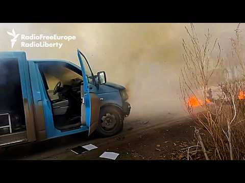 Moment Ukrainian Aid Worker Narrowly Escapes Death