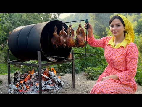 Cooking whole chickens in a barrel in the village