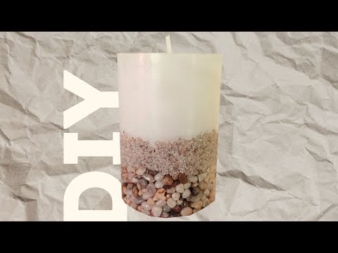 Свеча на камнях