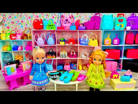 Elsa and Anna toddlers at the suitcase store