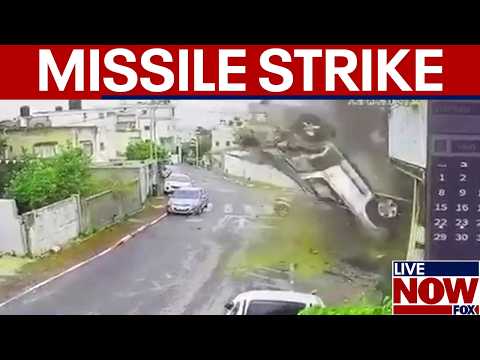 Iran strikes Israel neighborhood, video shows impact