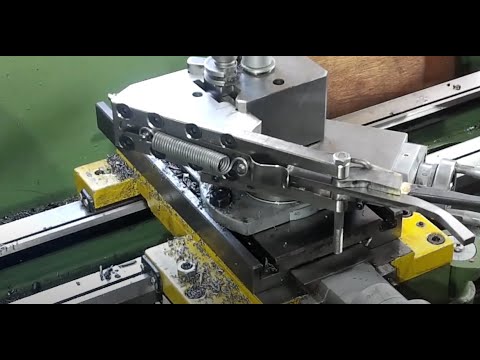 Auto Retracting Thread Cutter.