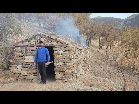 Designing a DIY winter Survival Shelter with fireplace.  bushcraft and stone shelter