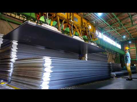 The process of making Japanese steel plates. A steel mill where Japanese craftsmen work.