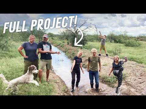 GREENING THE DESERT w/ RAINWATER? Off-Grid Family Builds Permaculture Berm & Swale, Plants Trees