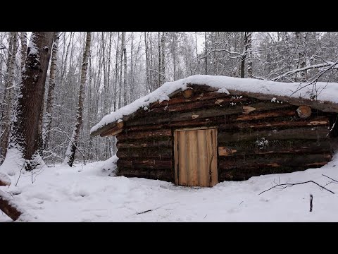 big underground cabin for winter, brand new wooden stove