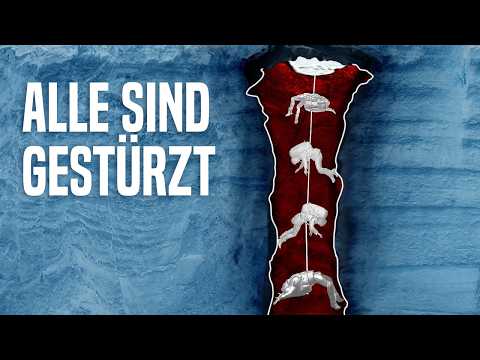 The climbers' rope breaks over a deep crevasse