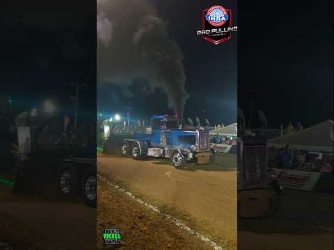 Holy Smokes Needle Nose Peterbilt Pulling Semi