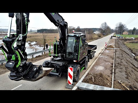 Podwożenie palet i zasypywanie geokraty | Czarne Volvo EWR170E steelwrist X20 SQ60 PK1 RCM