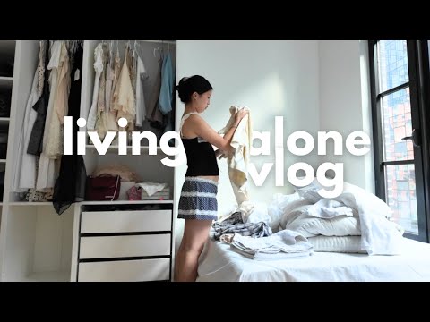 living alone vlog 🚕  decorating my apartment, struggles with curtain rod, grocery, cooking dinner