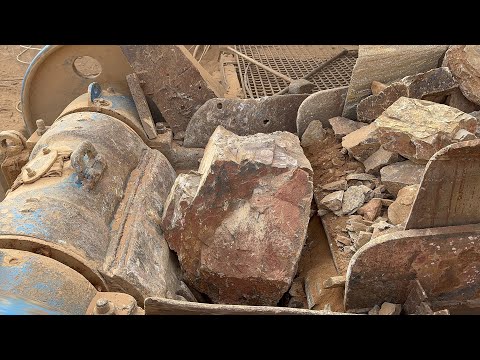 "Stone Crusher Machine: A Giant at Work"The Power of Stone: Machine Working in Action"#stonecrusher