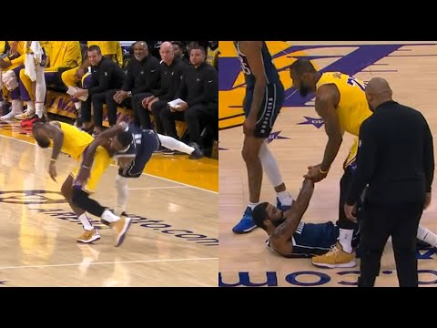 LeBron James takes out Kyrie Irving with hard hit and Kyrie goes to locker room 😬