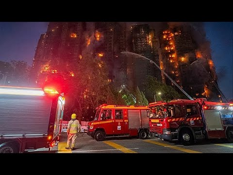 Thirteen dead as blaze engulfs Hong Kong residential complex