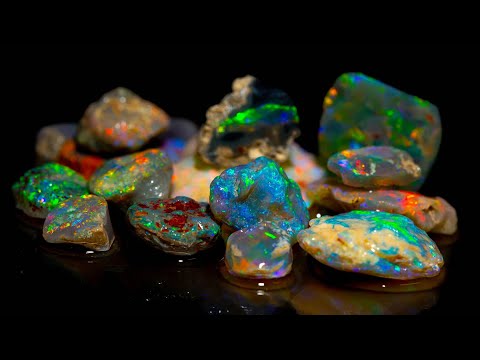 I cut $25k out of this uncut gem opal parcel