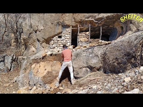 Build a hut in a stone cave with food and a fireplace