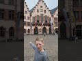 11 yr gives tour of Romerberg in Old Town Frankfurt Germany
