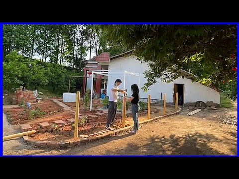 the process of the young couple renovating the old house and garden in the countryside