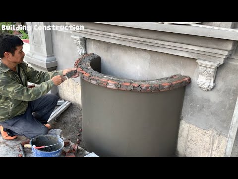 Construction Of Round Flower Beds On The Balcony Of The House With Bricks And Cement