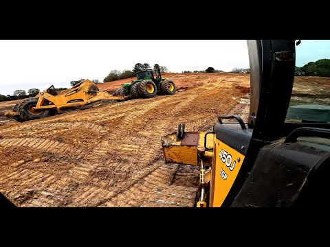 Building a temporary dam to keep us from being flooded out. Can we finish it before the rain starts?