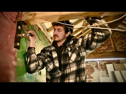 Trying to keep the coach house upright and warm.