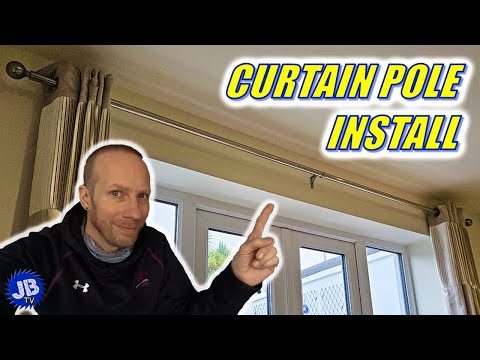 How to Fit a Curtain Pole - Into A Plasterboard Wall