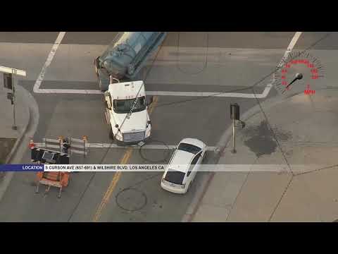 Police chase stolen tanker truck carrying 2,000 gallons of unknown liquid in Mid-Wilshire area of LA
