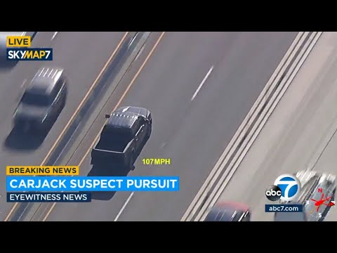 Police chasing carjacking suspect on 91 Freeway near Corona area