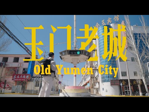 What is the small city in Gansu Province, China, that was "deserted" 20 years ago?