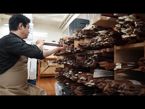 The process of making violin bows. Japanese craftsmen create violin bows using horse tail hair.