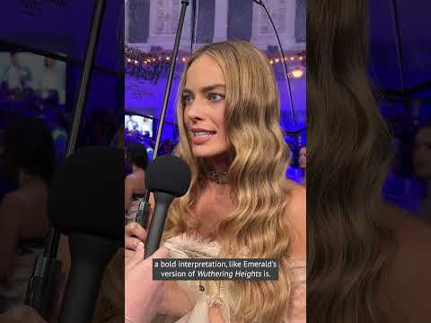 Margot Robbie on “weathering the storm” of outrage with Jacob Elordi at Wuthering Heights premiere.
