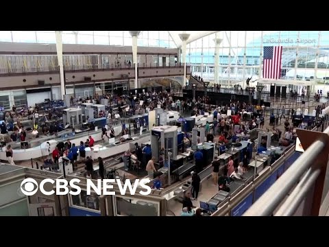 Watch: Long TSA lines, travel delays as partial government shutdown continues