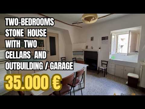 Two-bedroom stone house in habitable conditions with two cellars and a garage. Guilmi
