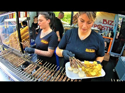 Street Food Fest in Italy. Grilled Meat, Burgers, Angus, Smoked Pork, Sausages, Octopus